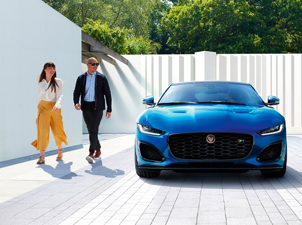 parked blue Jaguar E-PACE