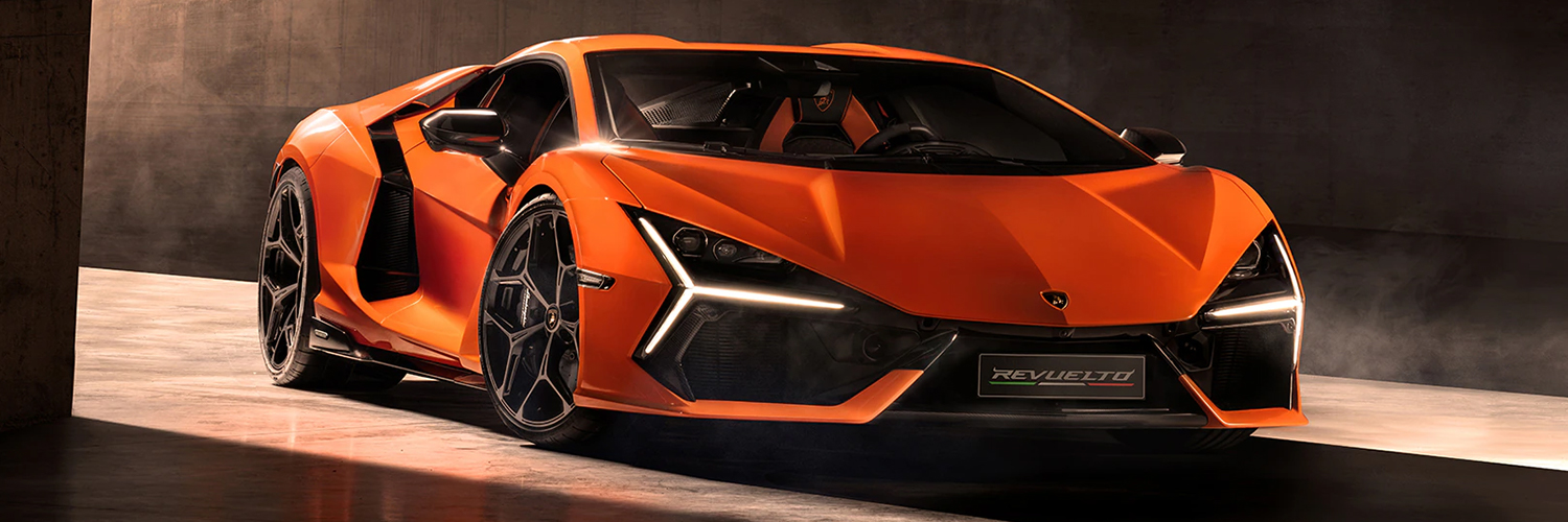 Orange Lambo Revuelto parked in a modern garage