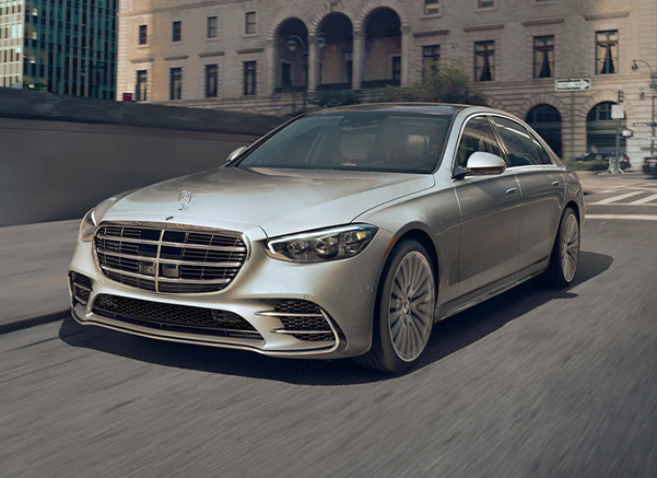 Mercedes Benz driving down the highway